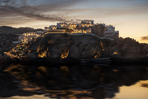 Hotel exterior illuminated at night