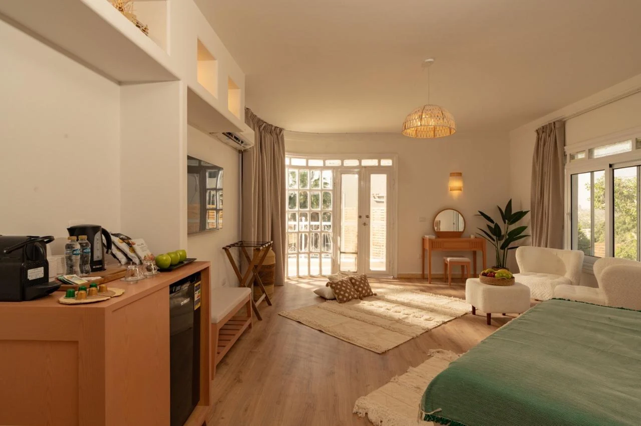 Noya luxury suite with botanical accents
